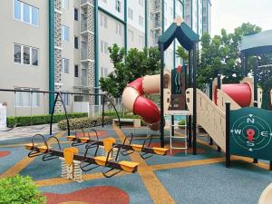 a park with a playground with a slide at KLIA Airport Xiamen Sepang WiFi Gym Pool 吉隆坡国际机场 厦门大学 in Kampong Bekoh