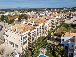 an aerial view of a large white building at Bright 3-BR in Guia with Shared Pool by Lisbeyond in Guia
