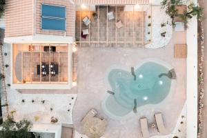 Nono's Fioro Premium Houses, By TK Property Managementの敷地内または近くにあるプール