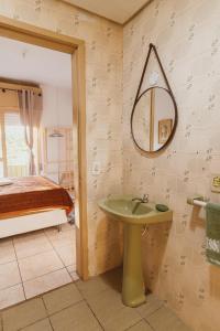 Ένα μπάνιο στο IKE Hospedagem Centro-Unidade2