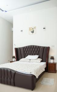 Ένα ή περισσότερα κρεβάτια σε δωμάτιο στο Cozy Escape +51 φωτογραφίες