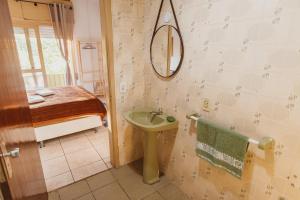 Ένα μπάνιο στο IKE Hospedagem Centro-Unidade2