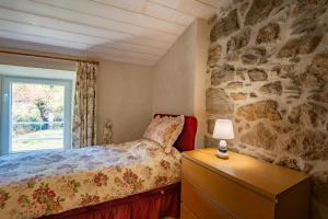 Postel nebo postele na pokoji v ubytování L'Ancienne Estable