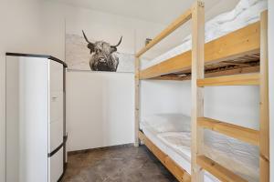 Postel nebo postele na pokoji v ubytování Ferienwohnung "Zum Segel" 1