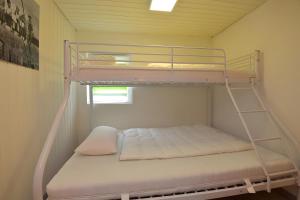 Postel nebo postele na pokoji v ubytování Ferienhaus 34