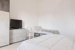 TV a/nebo společenská místnost v ubytování Affittacamere da Lory