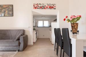 Posezení v ubytování Affittacamere da Lory