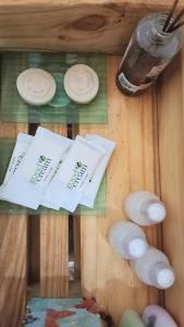 a wooden table with plates on top of it at La Casita de Seclantás in Seclantás