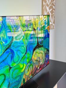 Et tv og/eller underholdning på Little Dream - Luxury Beach Retreat