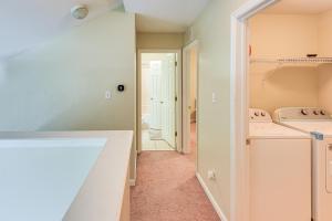 a kitchen with a sink and a laundry room at 4 Mi to FSU Pet-Friendly Townhome in Zion Hill +20 photos