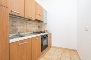 Η κουζίνα ή μικρή κουζίνα στο AffittaSardegna - Domo Pineta +16 φωτογραφίες