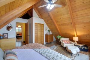 A bed or beds in a room at Coastal Cabin with Puget Sound and Rainier Views!