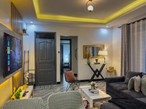 Μια τηλεόραση ή/και κέντρο ψυχαγωγίας στο Serene Abodes MB3