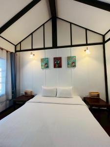 Ένα ή περισσότερα κρεβάτια σε δωμάτιο στο River View House