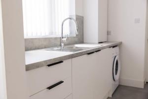 Køkken eller tekøkken på Northumberland Cosy Home