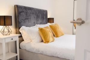 En eller flere senge i et værelse på Northumberland Cosy Home