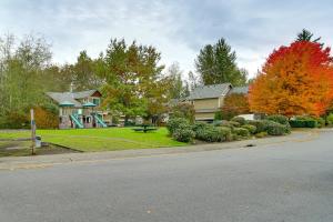 a house on the side of a road with trees at 6 Mi to Microsoft HQ! Remote Work Retreat in Redmond