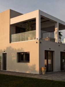 a large house with a plant on top of it at Cozy Aura Residence, by TK Property Management in Kalpaki