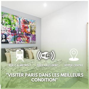 a room with a bed with a painting on the wall at Le Parisii I Proche RER C & METRO 7 I 2-3 peoples in Ivry-sur-Seine