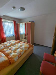 Postel nebo postele na pokoji v ubytování Gästehaus Stein im Thüringer Wald