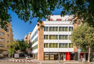 an office building on a city street at BYPILLOW Flamant in Barcelona