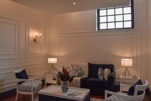 Χώρος καθιστικού στο Parc Royale Suites Hotel