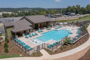 an aerial view of a pool with chairs and a house at Stylish Stay Off I-65, Pets Welcome in Acton