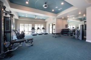 a gym with treadmills and machines in a room at Stylish Stay Off I-65, Pets Welcome in Acton