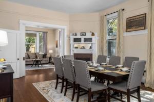 a dining room with a table and chairs at Historic Birmingham 4 BR 3 Bath in Birmingham