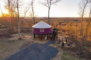 an aerial view of a yurt in a field at Starlit Haven - Modern Yurt in Brookville