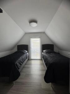 Giường trong phòng chung tại City Lounge Bielefeld 004