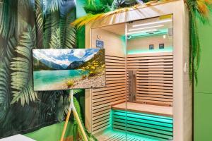 a sauna with a picture of a lake at Jungle & Sauna in Chaville