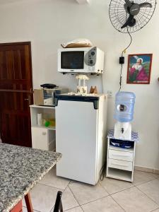 Кухня или мини-кухня в Casa na praia do Sonho
 +3 фотографии