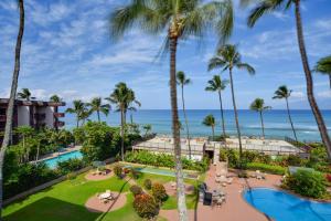 an aerial view of the resort with palm trees at Oceanfront Lahaina Condo with Balcony and Pool Access! in Kahana
