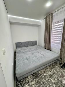 Postel nebo postele na pokoji v ubytování 1-Edinet apartament Квартира Единец