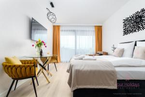 Ένα ή περισσότερα κρεβάτια σε δωμάτιο στο Your Holidays Infinity A333