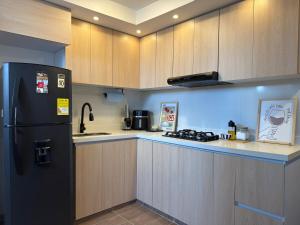 Kuchyň nebo kuchyňský kout v ubytování Central Tourist Apartment in Barranquilla