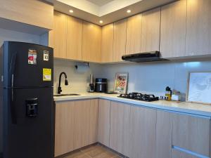 Kuchyň nebo kuchyňský kout v ubytování Central Tourist Apartment in Barranquilla