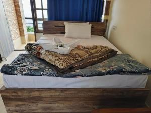 Postel nebo postele na pokoji v ubytování Resort Abhirup