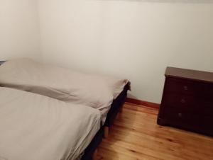 Ένα ή περισσότερα κρεβάτια σε δωμάτιο στο Gite à Cazaux - Bagnères de Luchon