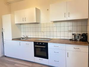 Η κουζίνα ή μικρή κουζίνα στο 92 City Rooms