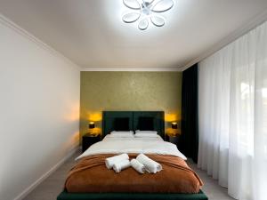 Postel nebo postele na pokoji v ubytování S&S Apartment 1 bedroom with balcony and garden free Parking at location 2 spaces