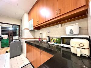 Kuchyň nebo kuchyňský kout v ubytování Asean Villa Afamosa