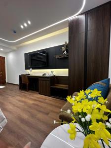 Et tv og/eller underholdning på THANH LAM Hotel - KĐT Xala- Hà Đông