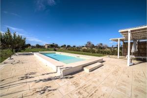 a swimming pool in a yard with a pavilion at Villa La Reimunda in Otranto +74 photos