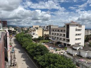 a view of a city with buildings and a street at Ashoka Residency in Katra