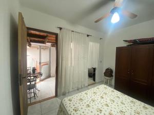 Кровать или кровати в номере Kitnet de temporada da Gi