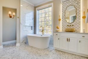 a white bathroom with a tub and a window at Million-Dollar Mtn Views! Gilford Gilded Loon in Glendale +35 photos