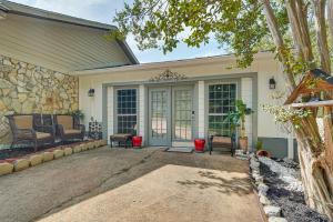 a home with a porch with a stone wall at 6 Mi to Clarks Hill Lake Quiet Studio Retreat in Clarks Hill