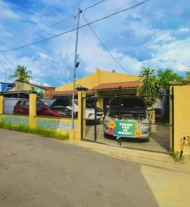 a fence in front of a parking lot at AB Pam Staycation Gensan up to 20 Pax in Lagao III